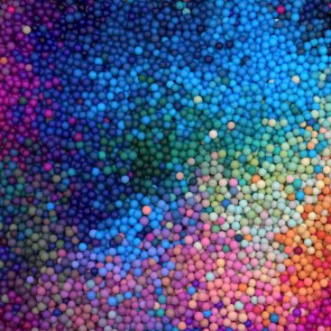 High resolution detailed 3D rendered abstract multicolored background texture with many small funny balls